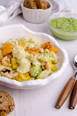 Vegetables with beans and green sauce