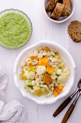 Vegetables with beans and green sauce