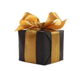 Beautiful gift box with golden ribbon and bow on white background