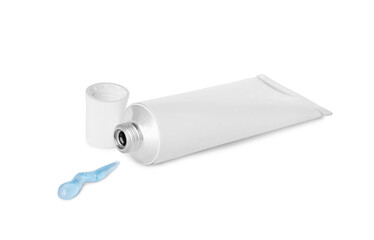 Open tube with ointment on white background