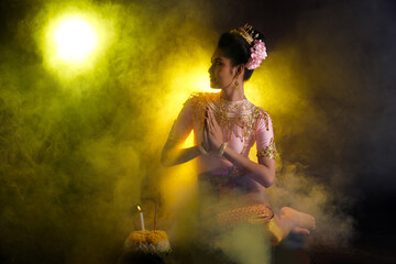 Loykrathong Dress of Thai Traditional Costume or South East Asia gold Dress in Asian Woman