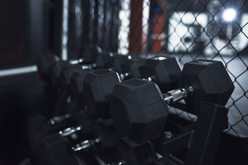 Get lifting to get those gains. Still life shot of dumbbells in a gym.
