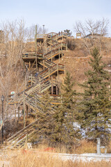 old Wooden staircase walkway in city with railing