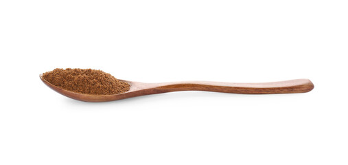 Spoon with nutmeg powder on white background