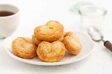 Delicious Palmier butterfly pastry in heart shape for Valentine's day dessert.