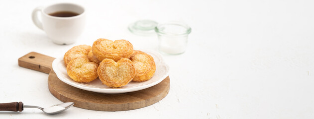 Delicious Palmier butterfly pastry in heart shape for Valentine's day dessert.