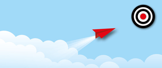 Red paper plane hitting in the target centre with cloud on sky blue background as metaphor for business target or goal success and winner, success concepts, space for the text. paper cut design style.