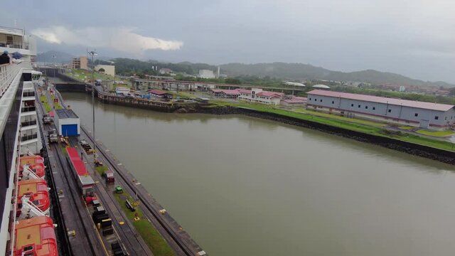 Panorama of Miraflores Locks at Panama Canal from deck of luxury cruise ship