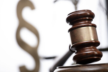 Law symbols composition. Law and justice concept.  Gavel and scale on gray background.