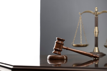 Law symbols composition. Law and justice concept.  Gavel and scale on gray background.