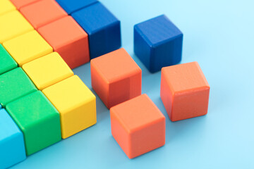 Toy blocks on a blue background