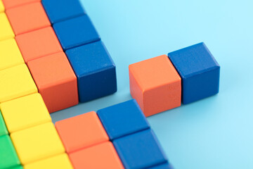 Fototapeta na wymiar Toy blocks on a blue background