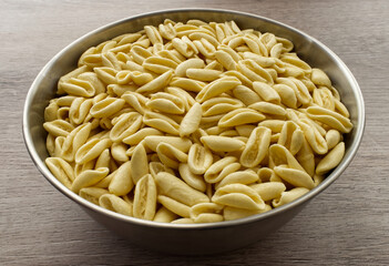 Traditional uncooked Italian Cavatelli. Cavatelli are a type of short pasta typical of Southern Italy, prepared only with semolina flour and water.