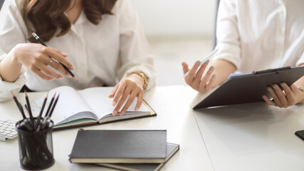 Businesspeople talking and discussing business strategy.