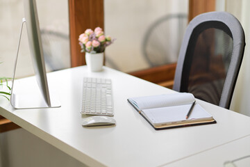 Minimal comfortable office desk with pc desktop computer