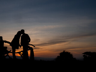 silhouette human love in sunset