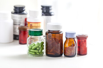 bottle of medicine onwhite background and no label bottle