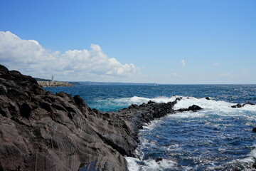 rock coast and lighthouse