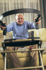 Elderly grandfather in nursing home using a walker