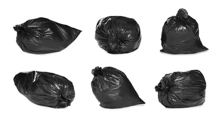 Set with trash bags filled with garbage on white background