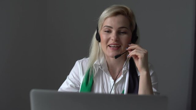 woman and flag of United Arab Emirates on computer, laptop keyboard