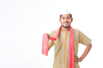 Young indian farmer in traditional wear and giving expression on white background.