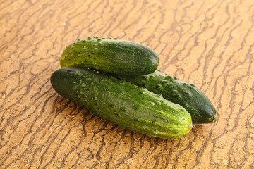 Fersh juicy green cucumbers heap