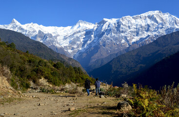 Fototapeta premium hiker in the mountainsPanoramic view of Mountain Annapurna was seen from Sikles village.