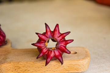 Roselle red subshrub plant (Hibiscus sabdariffa). Tropical flower, used to make infusion and juice