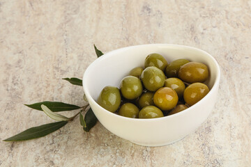 Tasty marinated olives in the bowl