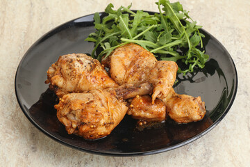 Roasted chicken leg with rucola