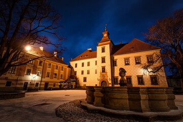 Fototapeta na wymiar Winter night at the Courtyard of Trebon Castle - Czech Republic.
