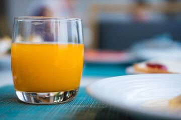 A glass of fresh squeezed orange juice