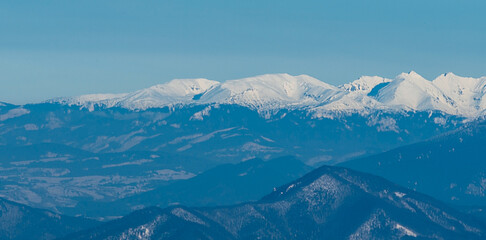 Fototapeta na wymiar Zapadne Tatry mountains from Martinske hole in winter Mala Fatra mountains in Slovakia