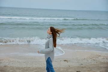 beautiful woman with long hair on the beach nature landscape walk Lifestyle