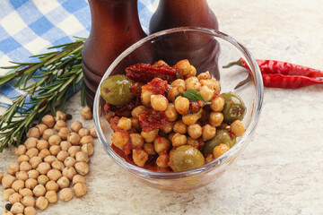 Chickpea beans with dry tomato and olives