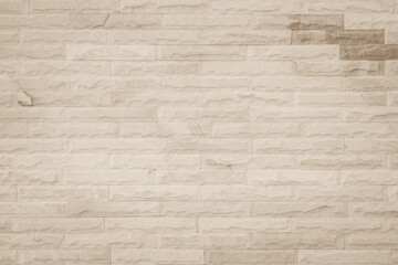 Cream and beige brick wall texture background. Brickwork and stonework flooring interior