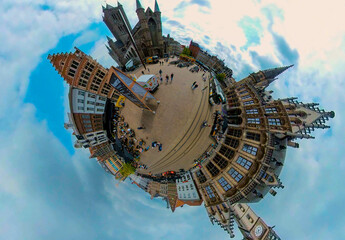 little planet view of the old town of  Ghent in Belgium. On an overcast day with no camera in view.