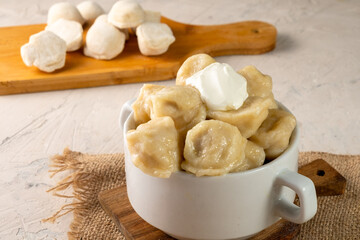 Russian traditional dumplings with homemade meat.