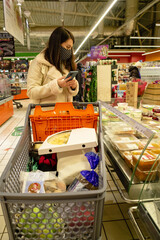 woman in store choosing product