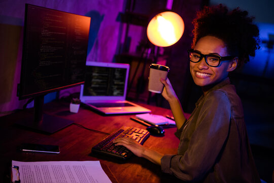 Photo of lady freelancer workaholic drink coffee ready solving hacker error side desk in modern evening late workplace workstation