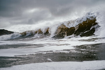 waves crashing on rocks