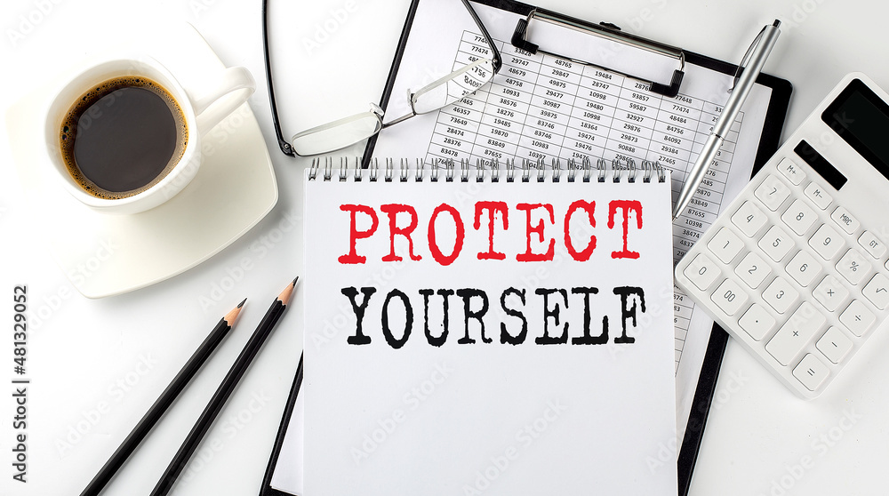 Poster protect yourself text on the paper with calculator, notepad, coffee ,pen with graph