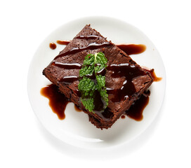 Plate with piece of tasty chocolate brownie isolated on white background