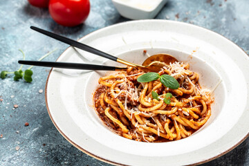 Pasta with meat, tomato sauce and vegetables, Italian pasta bolognese. banner, menu, recipe place for text, top view