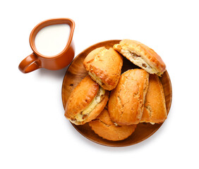 Plate of tasty sochniki with cottage cheese on white background