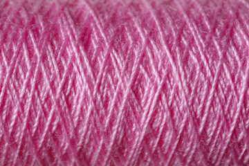 Pink sewing threads as background