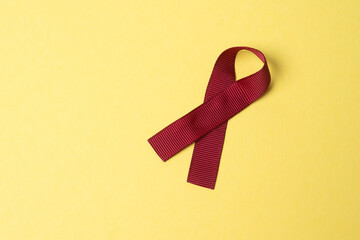 red ribbon symbol of the fight against AIDS