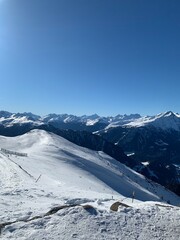 sunny winter morning on the swiss alps near Lenzerheide in Switzerland