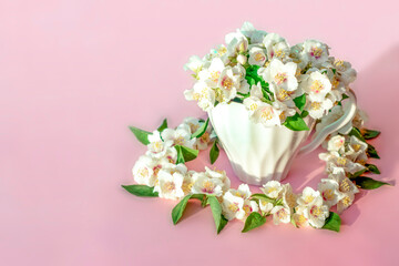A bouquet of jasmine. A heart of jasmine flowers.Greeting card.For the wedding, birthday, or other celebration.Valentine's Day background